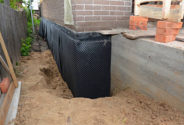 SJ Waterproofing Pros technician performing targeted Emergency Waterproofing assessment in Killbuck, OH